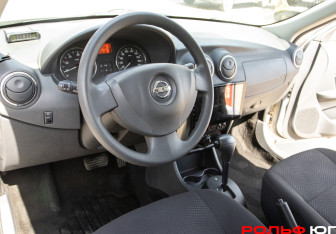 Подержанный автомобиль Nissan Almera Sedan 2014 года (13 фото)