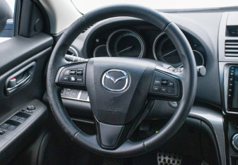 Подержанный автомобиль Mazda 6 Sedan 2010 года (15 фото)
