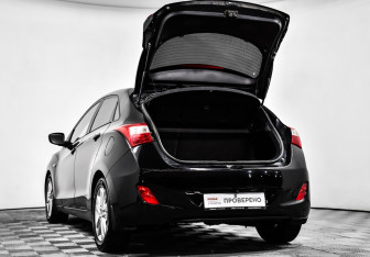Подержанный автомобиль Hyundai i30 Hatchback 2012 года (14 фото)