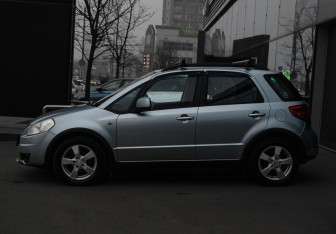 Подержанный автомобиль Suzuki SX4 Hatchback 2010 года (8 фото)
