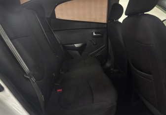 Подержанный автомобиль Kia Rio Sedan 2016 года (10 фото)