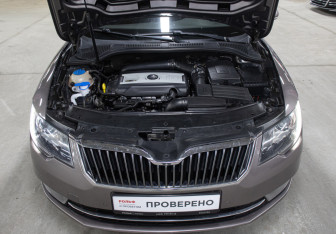 Подержанный автомобиль Skoda Superb Liftback 2014 года (9 фото)