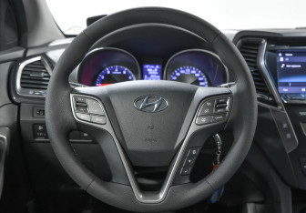 Подержанный автомобиль Hyundai Santa Fe 2014 года (6 фото)