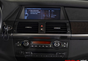 Подержанный автомобиль BMW X5 2010 года (14 фото)