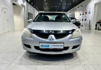 Подержанный автомобиль Mitsubishi Lancer Sedan 2004 года (2 фото)