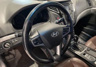 Подержанный автомобиль Hyundai i40 Wagon 2015 года (14 фото)