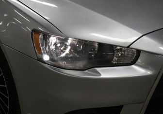 Подержанный автомобиль Mitsubishi Lancer Sedan 2011 года (22 фото)