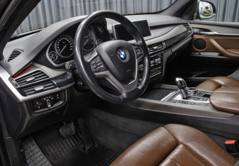 Подержанный автомобиль BMW X5 2014 года (16 фото)