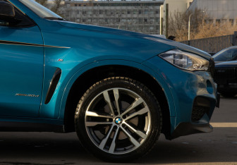Подержанный автомобиль BMW X6 2018 года (32 фото)