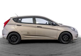 Подержанный автомобиль Hyundai Solaris Hatchback 2012 года (4 фото)