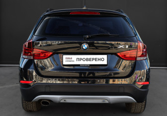 Подержанный автомобиль BMW X1 2014 года (5 фото)