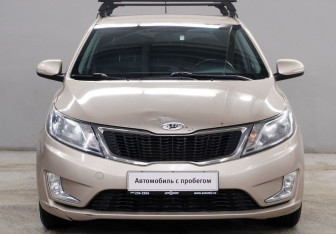 Подержанный автомобиль Kia Rio Hatchback 2013 года (2 фото)