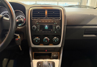 Подержанный автомобиль Dodge Caliber 2010 года (14 фото)
