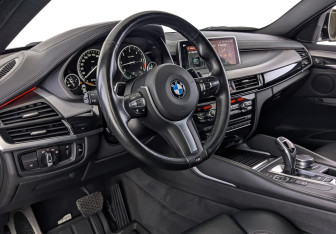 Подержанный автомобиль BMW X6 2018 года (15 фото)