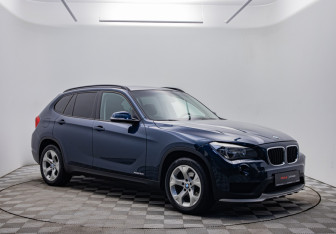 Подержанный автомобиль BMW X1 2014 года (3 фото)
