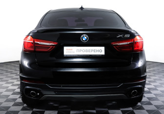 Подержанный автомобиль BMW X6 2015 года (6 фото)
