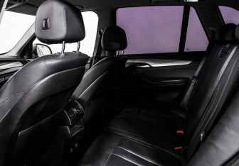 Подержанный автомобиль BMW X5 2015 года (12 фото)