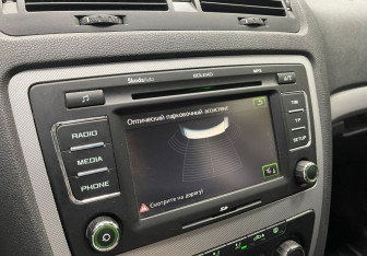 Подержанный автомобиль Skoda Octavia Liftback 2013 года (14 фото)