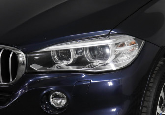 Подержанный автомобиль BMW X5 2014 года (7 фото)