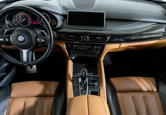 Подержанный автомобиль BMW X6 2016 года (11 фото)