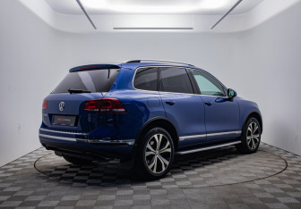 Подержанный автомобиль Volkswagen Touareg 2015 года (5 фото)
