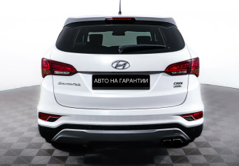 Подержанный автомобиль Hyundai Santa Fe 2015 года (6 фото)