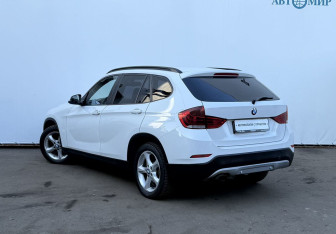Подержанный автомобиль BMW X1 2014 года (7 фото)