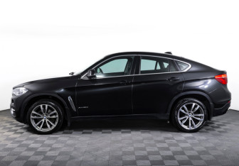 Подержанный автомобиль BMW X6 2016 года (8 фото)