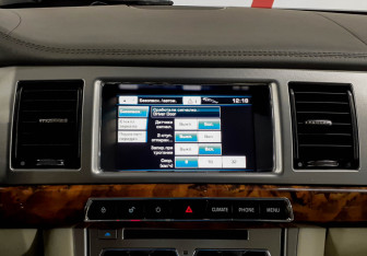 Подержанный автомобиль Jaguar XF Sedan 2013 года (16 фото)