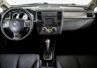 Подержанный автомобиль Nissan Tiida Sedan 2013 года (11 фото)