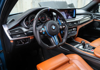 Подержанный автомобиль BMW X5 M 2015 года (15 фото)