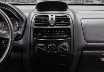 Подержанный автомобиль Mitsubishi Space Star Compactvan 2004 года (14 фото)