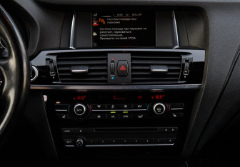 Подержанный автомобиль BMW X4 2015 года (11 фото)