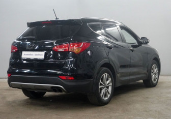 Подержанный автомобиль Hyundai Santa Fe 2015 года (8 фото)