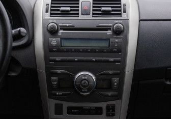 Подержанный автомобиль Toyota Corolla Sedan 2008 года (14 фото)