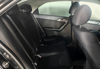 Подержанный автомобиль Kia Cerato Sedan 2013 года (10 фото)