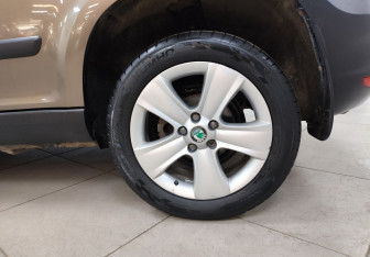 Подержанный автомобиль Skoda Yeti 2013 года (9 фото)