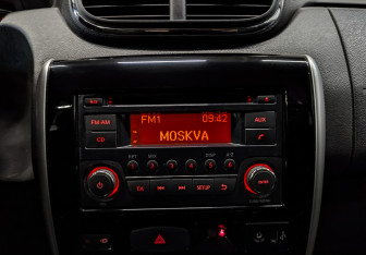 Подержанный автомобиль Nissan Terrano 2015 года (15 фото)