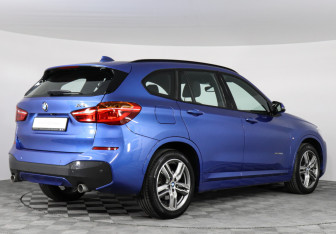 Подержанный автомобиль BMW X1 2016 года (2 фото)