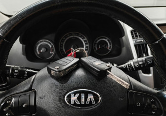 Подержанный автомобиль Kia Ceed Hatchback 2011 года (17 фото)