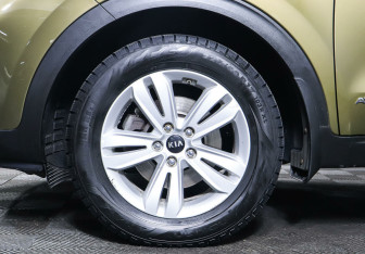 Подержанный автомобиль Kia Sportage 2016 года (10 фото)