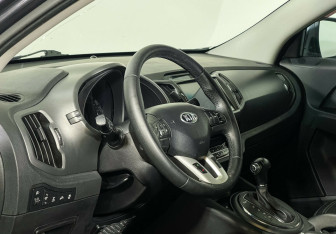 Подержанный автомобиль Kia Sportage 2013 года (9 фото)