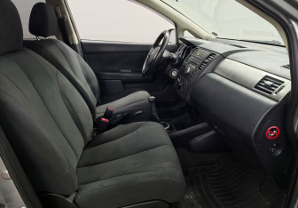 Подержанный автомобиль Nissan Tiida Sedan 2010 года (9 фото)