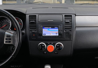 Подержанный автомобиль Nissan Tiida Hatchback 2013 года (12 фото)