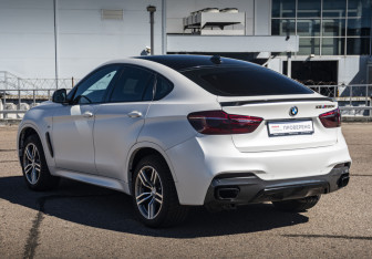 Подержанный автомобиль BMW X6 2016 года (7 фото)