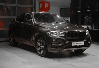 Подержанный автомобиль BMW X6 2016 года (3 фото)