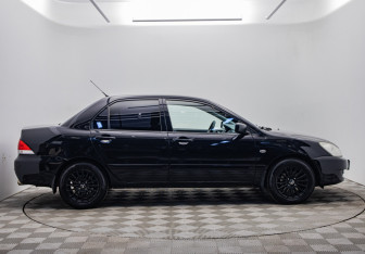 Подержанный автомобиль Mitsubishi Lancer Sedan 2006 года (6 фото)