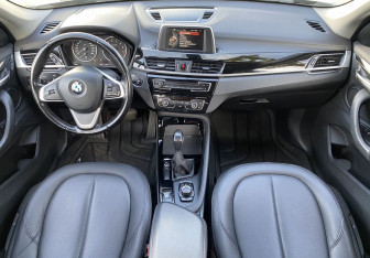 Подержанный автомобиль BMW X1 2016 года (10 фото)