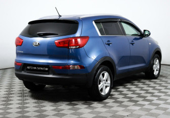 Подержанный автомобиль Kia Sportage 2014 года (5 фото)