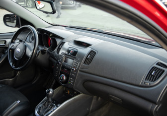 Подержанный автомобиль Kia Cerato Sedan 2012 года (7 фото)